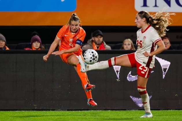 Marisa Olislagers of the Netherlands and Emma Regan of Canada¯¯¯¯battle for the ball Netherlands v Canada, Women s International Friendly, Länderspiel, Nationalmannschaft Netherlands v Canada, McDOS Goffertstadion, October 28, 2025, Nijmegen, Netherlands.