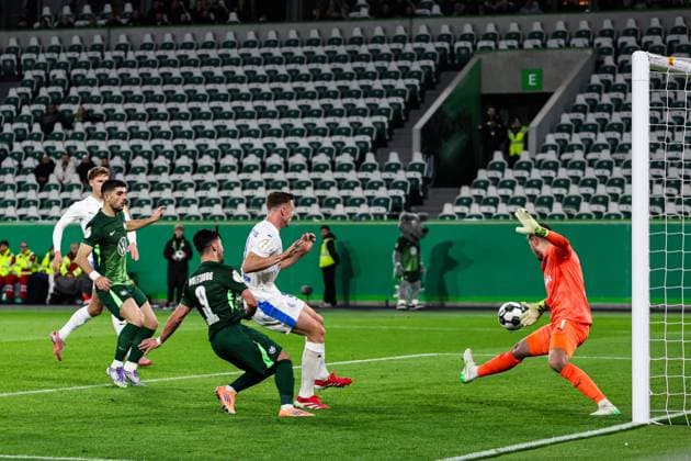Mohamed Amoura VfL Wolfsburg,9 vs Goalkeeper Timon Weiner Holstein Kiel,1 2 Round DFB Cup Season 2025 2026 VfL Wolfsburg vs Holstein Kiel at the Volkswagen Arena in Wolfsburg Action,Soccer,Germany,Man,Men,28 10 2025