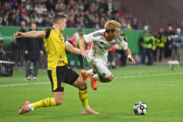 NO SALES IN JAPAN Ritsu DOAN Eintracht Frankfurt , action,duel against Nico SCHLOTTERBECK Borussia Dortmund Football DFB Pokal , 2 round Eintracht Frankfurt Borussia Dortmund 2 4 i E on 28 10 2025 , DEUTSCHE BANK PARK season 2025 2026,