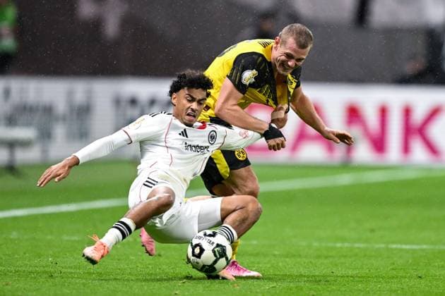 Nathaniel Brown Eintracht Frankfurt, 21 in duel with Julian Ryerson Dortmund, 26 , GER, Eintracht Frankfurt vs Borussia Dortmund Football DFB Pokal, 2 Round, Season 2025 2026, 28 10 2025 DFB regulations prohibit any use of photographs as image sequences and or quasi video GER, Eintracht Frankfurt vs Borussia Dortmund Football DFB Pokal, 2 Round, Season 2025 2026, 28 10 2025 Frankfurt am Main Copyright: xEibner-Pressefoto FlorianxWiegandx EP_FWD