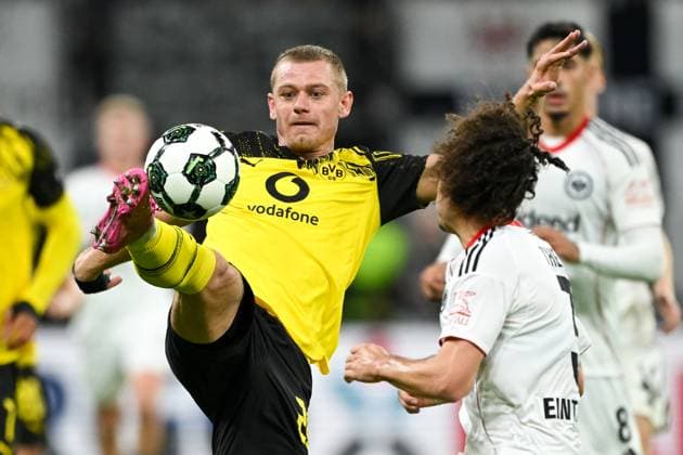 Julian Ryerson Dortmund, 26 in duel with Arthur Theate Eintracht Frankfurt, 03 GER, Eintracht Frankfurt vs Borussia Dortmund Football DFB Pokal, 2 Round, Season 2025 2026, 28 10 2025 DFB regulations prohibit any use of photographs as image sequences and or quasi video GER, Eintracht Frankfurt vs Borussia Dortmund Football DFB Pokal, 2 Round, Season 2025 2026, 28 10 2025 Frankfurt am Main Copyright: xEibner-Pressefoto FlorianxWiegandx EP_FWD