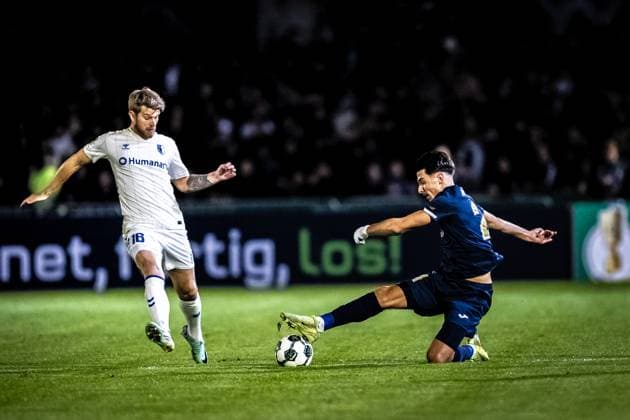 Football, Season 2025 2026, DFB Cup, Vöhlinstadion Illertissen, 2 Round, FV Illertissen 1 FC Magdeburg, 29 10 2025 29 10 2025, Football, Season 2025 2026, DFB Cup, Vöhlinstadion Illertissen, 2 Round, FV Illertissen 1 FC Magdeburg, f l 16 Marcus Mathisen 1 FC Magdeburg , 21 Denis Milic FV Illertissen Photo Lucca Fundel Illertissen Vöhlinstadion Bayern Germany