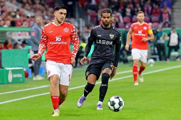 Mainz, Germany 29 October 2025 DFB Pokal 2025 2026 1 FSV Mainz 05 vs VfB Stuttgart In the picture from left in the duel Nadiem Amiri Mainz against Lorenz Assignon DFB regulations prohibit any use of photographs as image sequences and or quasi video Mewa Arena Rheinland Pfalz Copyright: xFotostandx xRacochax