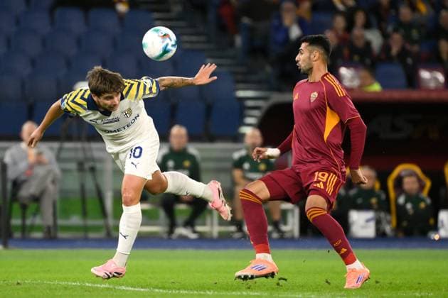 Adrian Bernabe of Parma Calcio and Zeki Celik of AS Roma during the Serie A 2025 2026 football match between AS Roma and Parma Calcio 1913 at Stadio Olimpico in Rome (Italy), October 29, 2025. AndreaxStaccioli