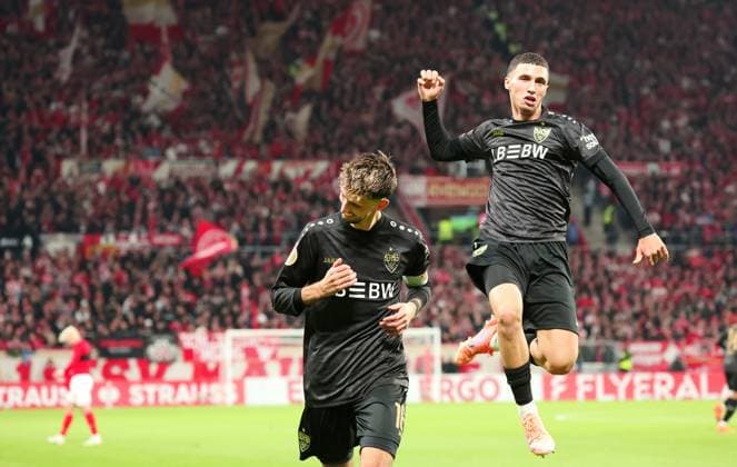 29 10 2025, Germany, Mainz, Soccer DFB Pokal 2 round, season 2025 2026, 1 FSV Mainz 05 vs VfB Stuttgart, cheering after the 0 2 goal, scorer Atakan Karazor VfB , right Bilal El Khannouss VfB