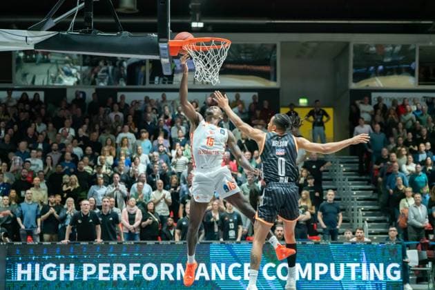 Chemnitz, Germany October 29, 2025 BKT EuroCup 2025 2026 Niners Chemnitz vs Ratiofarm Ulm In the picture from left in a duel Ty Brewer 99 and Nelson Weidemann ULM with a dunk at the basket Copyright: xFotostandx xNachtigallx