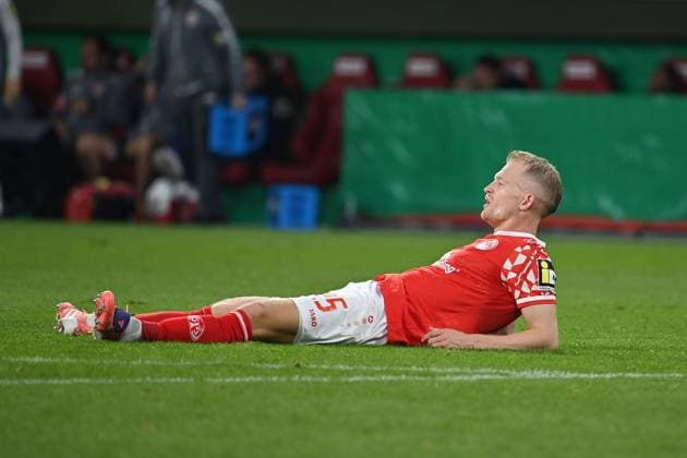 Andreas HANCHE OLSEN 1 FSV Mainz 05 on the ground after the end of the match, disappointment,frustration,disappointed,frustrated,dejected, Football DFB Cup , 2 Round 1 FSV Mainz 05 VfB Stuttgart 2 0 on 29 10 2025 , MEWA ARENA Season 2025 2026,