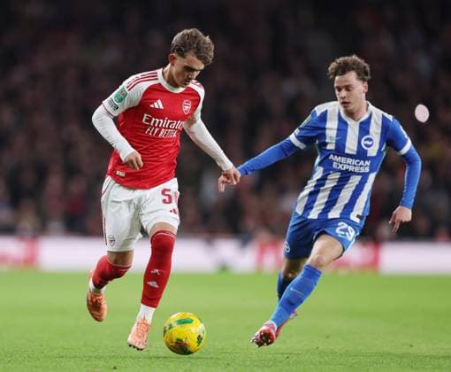 London, England, 29th October 2025. Max Dowman of Arsenal takes on Maxim De Cuyper of Brighton during the Arsenal vs Brighton and Hove Albion Carabao Cup match at the Emirates Stadium, London. Picture credit should read: David Klein Sportimage EDITORIAL USE ONLY. No use with unauthorised audio, video, data, fixture lists, club league logos or live services. Online in-match use limited to 120 images, no video emulation. No use in betting, games or single club league player publications. SPI_003_DK_Arsenal_Brighton SPI-4249-0003