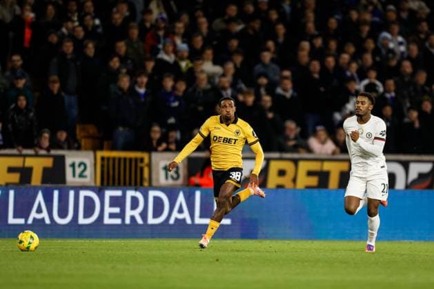 Wolverhampton Wanderers v Chelsea Carabao Cup Jackson Tchatchoua of Wolverhampton Wanderers and Jorrel Hato of Chelsea during the Carabao Cup Fourth Round match at Molineux, Wolverhampton UK Newspapers OUT Copyright: xMaxxTomlinsonx FIL-22420-0021