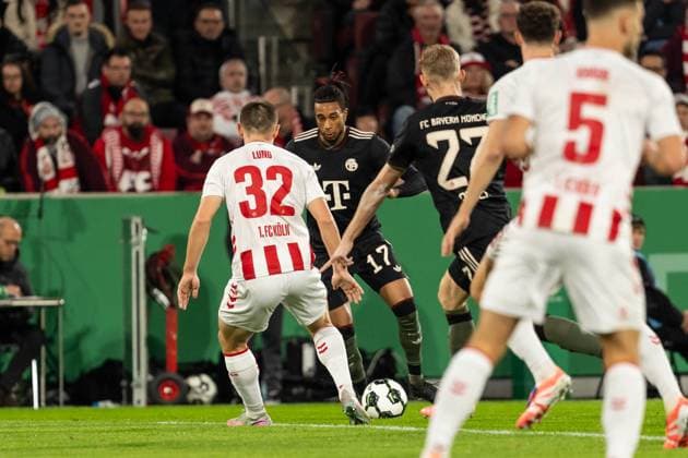 GER, DFB Pokal 2 Runde, 1 FC Köln vs FC Bayern München Muenchen 29 10 2025, RheinEnergieSTADION, Köln, GER, DFB Pokal 2 Runde, 1 FC Köln vs FC Bayern München Muenchen im Bild Zweikampf zwischen Michael Olise FC Bayern München Muenchen, 17 und Kristoffer Lund 1 FC Köln Koeln, 32 nordphotoxGmbHxx xChristianxSchulze nph000300