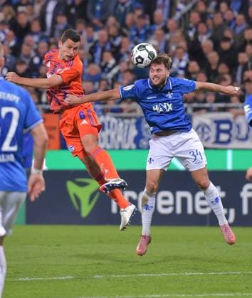 29 10 2025, xblx, Fußball DFB Pokal 2 Runde, SV Darmstadt 98 FC Schalke 04 v l Ron Schallenberg FC Schalke 04 , Killian Corredor SV Darmstadt 98 DFL DFB REGULATIONS PROHIBIT ANY USE OF PHOTOGRAPHS as IMAGE SEQUENCES and or QUASI VIDEO Darmstadt