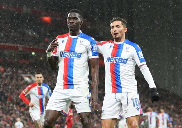 Liverpool, England, 29th October 2025. Ismaila Sarr of Crystal Palace (l) celebrates scoring their first goal with Yeremi Pino of Crystal Palace (r) during the Liverpool vs Crystal Palace Carabao Cup match at Anfield, Liverpool. Picture credit should read: Jessica Hornby Sportimage EDITORIAL USE ONLY. No use with unauthorised audio, video, data, fixture lists, club league logos or live services. Online in-match use limited to 120 images, no video emulation. No use in betting, games or single club league player publications. SPI_010_JH_Liverpool_Crystal_Palace SPI-4246-0010