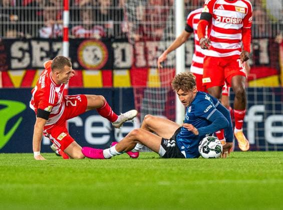 Soccer, Men, Season 2025 2026, DFB Cup 2 Round , 1 FC Union Berlin DSC Arminia Bielefeld, f l Tim Skarke 1 FC Union Berlin , Joel Grodowski Bielefeld , 29 10 2025, Copyright: xSebastianxRäppold MatthiasxKochx