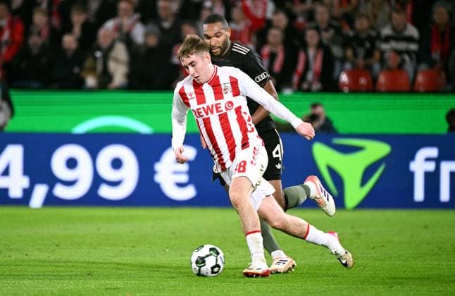 Football, DFB Cup, Germany, Men, Season 2025 2026, 2nd round, Rhein Energie Stadion Köln, 1 FC Köln FC Bayern München Isak Johannesson KOE , Jonathan Tah FCB Action