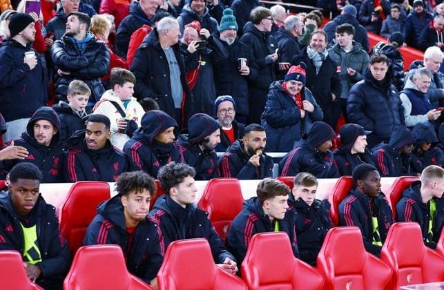 Mohamed Salah of Liverpool eats pineapple with many team-mates who do not feature in the game Liverpool v Crystal Palace, EFL Carabao Cup, Fourth Round, Football, Anfield, Liverpool, UK - 29 Oct 2025Liverpool Anfield United Kingdom EDITORIAL USE ONLY No use with unauthorised audio, video, data, fixture lists, club league logos or live services. Online in-match use limited to 120 images, no video emulation. No use in betting, games or single club league player publications. Copyright: xMattxWest Shutterstockx 15627839ag