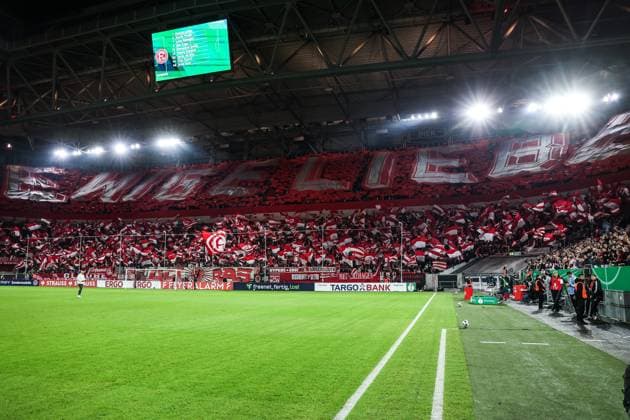 Sport, Football, DFB Pokal season 2025 2026 2nd round Fortuna Düsseldorf SC Freiburg 29 10 2025, MERKUR SPIEL ARENA Fans Fortuna Düsseldorf with a choreo before the match Düsseldorf MERKUR SPIEL ARENA North Rhine-Westphalia Germany