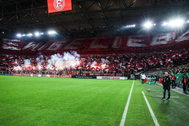Sport, Football, DFB Pokal season 2025 2026 2nd round Fortuna Düsseldorf SC Freiburg 29 10 2025, MERKUR SPIEL ARENA Fans Fortuna Düsseldorf with a choreo before the match with pyro Düsseldorf MERKUR SPIEL ARENA Nordrhein Westfalen Germany