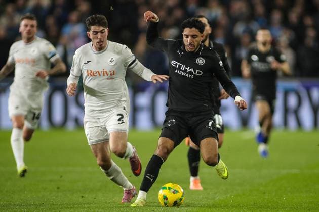 Carabao Cup Last 16 Swansea City v Manchester City Omar Marmoush of Manchester City and Josh Key of Swansea City compete for the ball during the Carabao Cup Last 16 Swansea City vs Manchester City at Swansea.com Stadium, Swansea, United Kingdom, 29th October 2025 (Photo by Andrew Lewis News Images) Swansea Swansea.com Stadium West Glamorgan United Kingdom Copyright: xAndrewxLewis NewsxImagesx