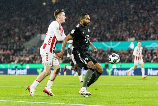 COLOGNE, GERMANY - OCTOBER 29: Jonathan Tah (FC Bayern Muenchen, 4) defends the ball against Isak Johannesson (1. FC Koeln, 18) during the DFB Pokal match between 1. FC Koeln vs. FC Bayern Muenchen at RheinEnergiestadion on matchday 2 of DFB Pokal on October 28, 2025 in Cologne, Germany. DFB REGULATIONS PROHIBIT ANY USE OF PHOTOGRAPHS AS IMAGE SEQUENCES AND OR QUASI-VIDEO. North Rhine Westphalia Germany Copyright: xBEAUTIFULxSPORTS Wunderlx