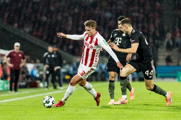 COLOGNE, GERMANY - OCTOBER 29: Sebastian Sebulonsen (1. FC Koeln, 28) controls the ball against Josip Stanisic (FC Bayern Muenchen, 44) during the DFB Pokal match between 1. FC Koeln vs. FC Bayern Muenchen at RheinEnergiestadion on matchday 2 of DFB Pokal on October 28, 2025 in Cologne, Germany. DFB REGULATIONS PROHIBIT ANY USE OF PHOTOGRAPHS AS IMAGE SEQUENCES AND OR QUASI-VIDEO. North Rhine Westphalia Germany Copyright: xBEAUTIFULxSPORTS Wunderlx