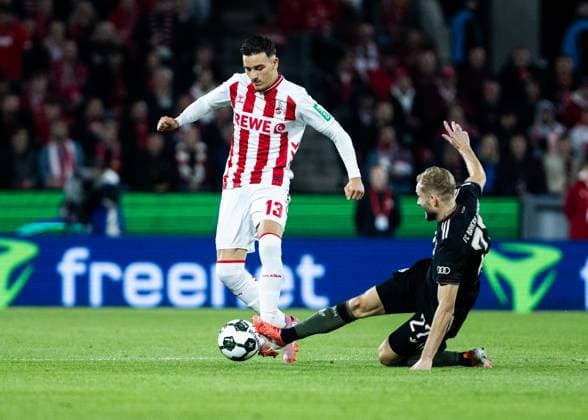 Koeln, RheinEnergieStadion, 29 10 2025 Said El Mala of Koeln challenges Konrad Laimer of Muenchen during the second round DFB Cup match between 1 FC Koeln vs FC Bayern Muenchen