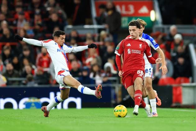 Liverpool, England, 29th October 2025. Kieran Morrison is challenged by Yeremy Pino of Crystal Palace during the Liverpool vs Crystal Palace Carabao Cup match at Anfield, Liverpool. Picture credit should read: Jessica Hornby Sportimage EDITORIAL USE ONLY. No use with unauthorised audio, video, data, fixture lists, club league logos or live services. Online in-match use limited to 120 images, no video emulation. No use in betting, games or single club league player publications. SPI_035_JH_Liverpool_Crystal_Palace SPI-4246-0035