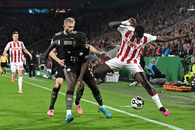 Dayot Upamecano (FC Bayern Muenchen), Konrad Laimer (FC Bayern Muenchen) und Ragnar Ache (1. FC Koeln) im Zweikampf waehrend des Spiels der 2. Runde im DFB-Pokal zwischen 1. FC Köln und FC Bayern München im Rhein-Energie-Stadion am 29. October 2025 in Köln, Deutschland. (Foto von Ralf Treese DeFodi Images) +++ Dayot Upamecano (FC Bayern Muenchen), Konrad Laimer (FC Bayern Muenchen) und Ragnar Ache (1. FC Koeln) battle for the ball during the DFB-Cup - Second Round match between 1. FC Koeln and FC Bayern München at Rhein-Energie-Stadion on October 29, 2025 in Koeln, Germany. (Photo by Ralf Treese DeFodi Images) DFB DFL REGULATIONS PROHIBIT ANY USE OF PHOTOGRAPHS AS IMAGE SEQUENCES AND OR QUASI-VIDEO. (Photo by Ralf Treese DeFodi Images) Dayot Upamecano FC Bayern Muenchen , Konrad Laimer FC Bayern Muenchen and Ragnar Ache 1 FC Koeln battle for the ball during the DFB Cup Second Round match between 1 FC Koeln and FC Bayern München at Rhein Energie Stadion on October 29, 2025 in Cologne, Germany Photo by Ralf Treese DeFodi Images Dayot Upamecano FC Bayern Muenchen , Konrad Laimer FC Bayern Muenchen and Ragnar Ache 1 FC Koeln battle for the ball during the DFB Cup Second Round match between 1 FC Koeln and FC Bayern München at Rhein Energie Stadion on October 29, 2025 in Koeln, Germany Photo by Ralf Treese DeFodi Images DFB DFL REGULATIONS PROHIBIT ANY USE OF PHOTOGRAPHS AS IMAGE SEQUENCES AND OR QUASI VIDEO Photo by Ralf Treese DeFodi Images