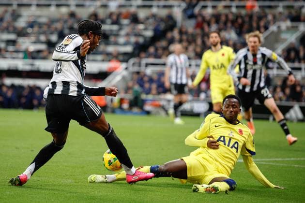 29th October 2025; St James Park, Newcastle, England; EFL Carabao Cup Football, Newcastle United versus Tottenham Hotspur; Anthony Elanga of Newcastle United is challenged by Pape Matar Sarr of Tottenham Hotspur  CraigxCowan