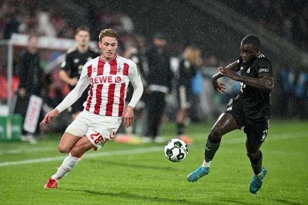 from left in duel Sebastian Sebulonsen Koeln 28 Dayot Upamecano Muenchen 2 29 10 2025 Soccer 1 FC Koeln vs FC Bayern Muenchen, Rheinenergiestadion, Koeln, DFB DFL REGULATIONS PROHIBIT ANY USE OF PHOTOGRAPHS AS IMAGE SEQUENCES AND OR QUASI VIDEO Copyright: xpepphotox xHorstxMauelshagenx pep00321, pep_20251029_hm_185688