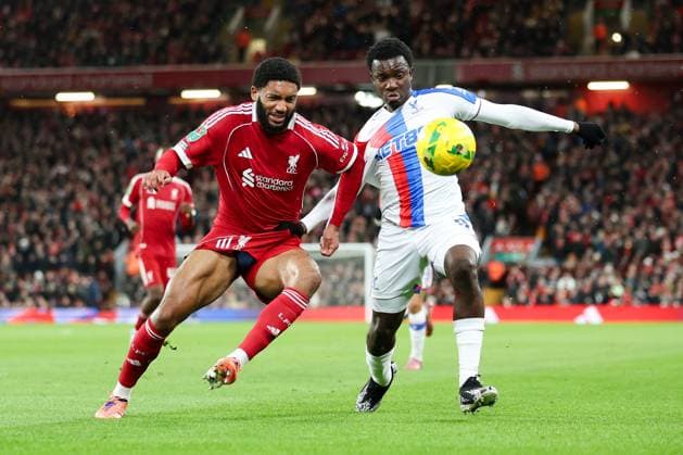 Liverpool, England, 29th October 2025. Eddie Nketiah of Crystal Palace is challenged by Joe Gomez of Liverpool during the Liverpool vs Crystal Palace Carabao Cup match at Anfield, Liverpool. Picture credit should read: Jessica Hornby Sportimage EDITORIAL USE ONLY. No use with unauthorised audio, video, data, fixture lists, club league logos or live services. Online in-match use limited to 120 images, no video emulation. No use in betting, games or single club league player publications. SPI_058_JH_Liverpool_Crystal_Palace SPI-4246-0058