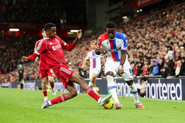 Liverpool, England, 29th October 2025. Marc Guehi of Crystal Palace is challenged by Trey Nyoni of Liverpool during the Liverpool vs Crystal Palace Carabao Cup match at Anfield, Liverpool. Picture credit should read: Jessica Hornby Sportimage EDITORIAL USE ONLY. No use with unauthorised audio, video, data, fixture lists, club league logos or live services. Online in-match use limited to 120 images, no video emulation. No use in betting, games or single club league player publications. SPI_061_JH_Liverpool_Crystal_Palace SPI-4246-0061