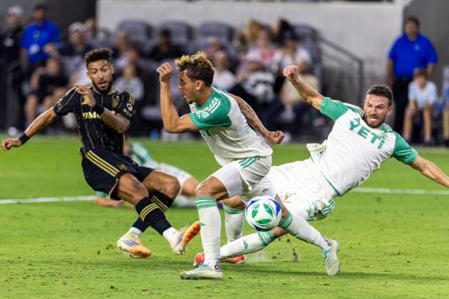 October 29, 2025, Los Angeles, California, USA: Los Angeles FCÃ¢â‚¬â ¢s Denis Bouanga (99) shoots against Austin FCÃ¢â‚¬â ¢s Guilherme Biro (29) and Brendan Hines-Ike (4) during an MLS, Fussball Herren, USA Cup Playoffs game, in Los Angeles Wednesday, Oct. 29, 2025. Los Angeles USA - ZUMAc68_ 20251029_zaf_c68_016 Copyright: xRingoxChiux