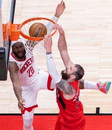 (251030) -- TORONTO, Oct. 30, 2025 -- Sandro Mamukelashvili (R) of Toronto Raptors dunks during the 2025-2026 NBA, Basketball Herren, USA regular season game between Toronto Raptors and Houston Rockets in Toronto, Canada, on Oct. 29, 2025. (Photo by Xinhua) (SP)CANADA-TORONTO-BASKETBALL-NBA-ROCKETS VS RAPTORS ZouxZheng 