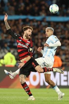 Flamengo s defender Leo Pereira L vies for the ball with Racing Club s Uruguayan forward Adrian Balboa during the CONMEBOL Copa Libertadores semi final footbal match second leg between Argentina™s Racing Club and Brazil™s Flamengo at Presidente Juan Domingo Peron stadium in Avellaneda, Buenos Aires, Argentina on October 29, 2025 AVELLANEDA ARGENTINA Copyright: xALEJANDROxPAGNIx
