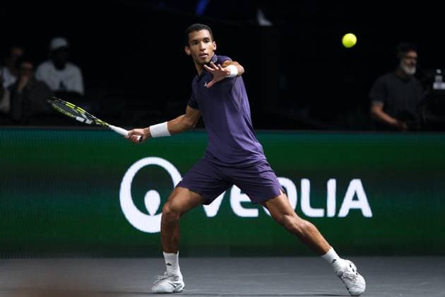 October 30, 2025, Nanterre, Hauts De Seine, France: FELIX AUGER ALIASSIME (CAN) returns the ball to DANIEL ALTMAIER (GER) during the round of 16 of Rolex Paris Masters 1000 tournament at La Defense Arena Stadium - Nanterre - France..Auger Aliassime won 3:6 6:3 6:2 Nanterre France - ZUMAp119 20251030_zaf_p119_036 Copyright: xPierrexSteveninx