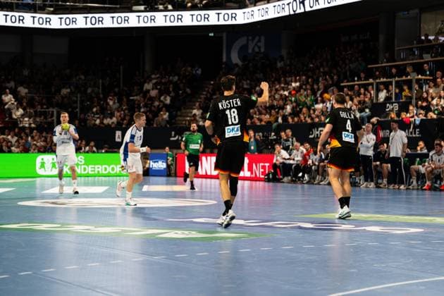 Julian Köster 18 Germany with ball, while Johannes Golla 4 Germany and Gisli Thorgeir Kristjansson 10 Iceland defend Julian Köster 18 Germany with ball in action Copyright: xspeedshotx