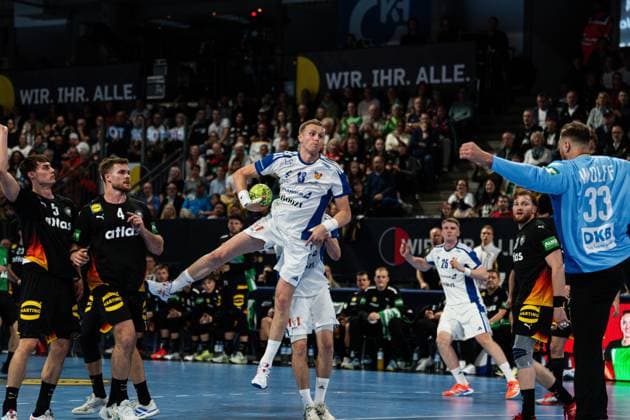 Elliott Snaer Vidarsson 18 Iceland with ball in jump, while Miro Schluroff 5 Germany , Johannes Golla 4 Germany and Marko Grgi 71 Germany defend, David Späth 1 Germany holds goalkeeper position, Haukur Thrastarson 25 Iceland supports in the back Elliott Snaer Vidarsson 18 Iceland in jump shot against Miro Schluroff 5 Germany and Johannes Golla 4 Germany Copyright: xspeedshotx