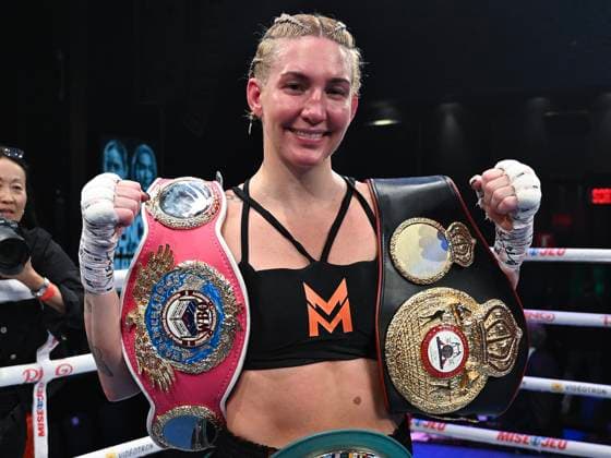 October 31, 2025, Montreal, Pq, Canada: Mikaela Mayer poses with the WBA, WBO and WBC belts following her Super Welterweight Championship fight against Mary Spencer in Montreal, Thursday, Oct. 30, 2025. Mary Spencer, Mikaela Mayer,  - ZUMAc35_ 20251031_zaf_c35_004 Copyright: xGrahamxHughesx