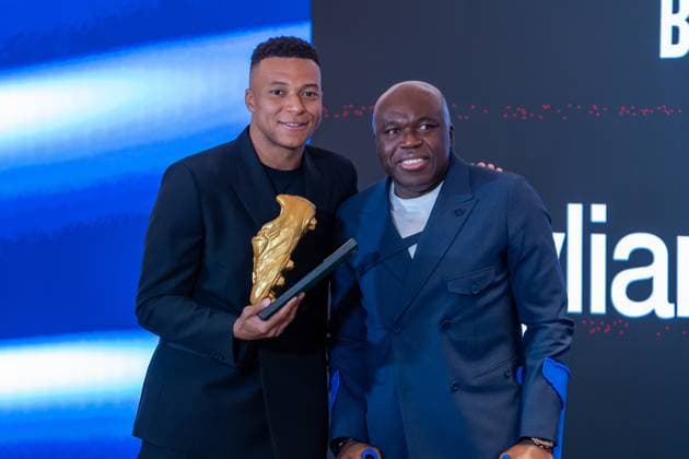 Real Madrid CF™s Kylian Mbappe (l) with his father Wilfried Mbappe during the ceremony of the Golden Boot 2024-25. October 31, 2025. (20251031267)
