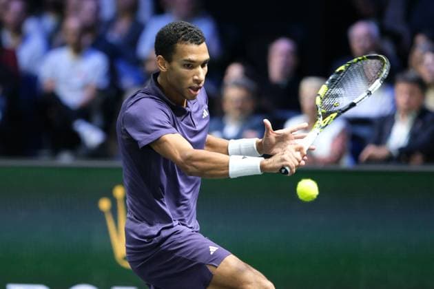 October 31, 2025, Nanterre, Hauts De Seine, France: FELIX AUGER ALIASSIME (CAN) returns the ball to VALENTIN VACHEROT (MON) during the quarter final of Rolex Paris Masters 1000 tournament at La Defense Arena Stadium - Nanterre - France..Auger Aliassime won 6:2 6:2 Nanterre France - ZUMAp119 20251031_zaf_p119_011 Copyright: xPierrexSteveninx