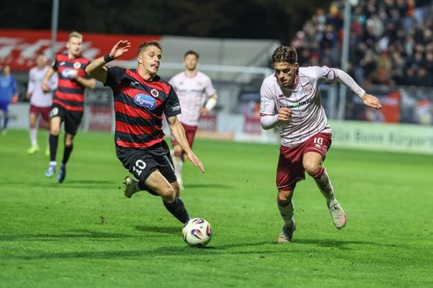 3 Liga FC Viktoria Köln FC Ingolstadt 04 duel Battle for the ball Dennis Kaygin 10, FCI Otto David 10 VK 3 Liga FC Ingolstadt 04 Season 2025 2026 FC Viktoria Köln