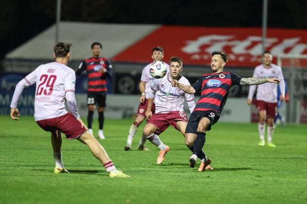 3 Liga FC Viktoria Köln FC Ingolstadt 04 duel Battle for the ball Gustav Christensen 24, FCI Handle Simon 7 VK Julian Kügel 29, FCI 3 Liga FC Ingolstadt 04 Season 2025 2026 FC Viktoria Köln