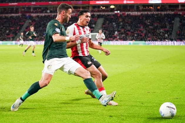 2025-10-31 PSV v Fortuna Sittard - Dutch Eredivisie EINDHOVEN, NETHERLANDS - OCTOBER 31: Ivo Pinto of Fortuna Sittard, Couhaib Driouech of PSV during the Dutch Eredivisie match between PSV and Fortuna Sittard at Philips Stadium on October 31, 2025 in Eindhoven, Netherlands. Eindhoven Philips Stadium Netherlands Content not available for redistribution in The Netherlands directly or indirectly through any third parties. Copyright: xAndrexWeeningx