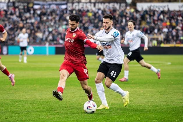 Football, Season 2025 2026, 3 Liga, Donaustadion Ulm, Matchday 13, SSV Ulm 1846 Football VfB Stuttgart II, 01 11 2025 01 11 2025, Football, Season 2025 2026, 3 Liga, Donaustadion Ulm, Matchday 13, SSV Ulm 1846 Football VfB Stuttgart II, v l 42 Leonidas Stergiou VfB Stuttgart II , 43 Leon Dajaku SSV Ulm 1846 Football Photo Lucca Fundel Ulm Donaustadion Baden Württemberg Germany