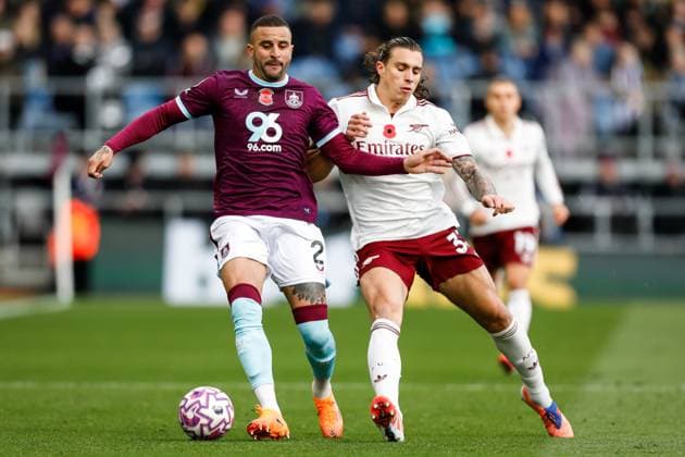 Burnley v Arsenal Premier League Kyle Walker of Burnley and Riccardo Calafiori of Arsenal during the Premier League match at Turf Moor, Burnley UK Newspapers OUT Copyright: xMaxxTomlinsonx FIL-22434-0045