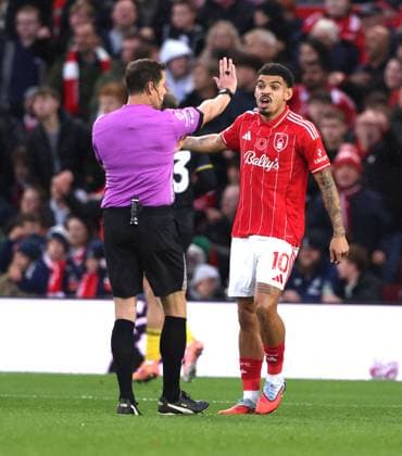 Morgan Gibbs-White (NF) protests to referee Darren England after the first Man Utd goal (0-1) at the Nottingham Forest v Manchester United, ManU EPL match, at The City Ground, Nottingham, Notts.. 