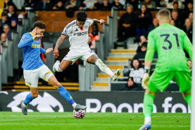 1st November 2025; Craven Cottage, Fulham, London, England; Premier League Football, Fulham versus Wolverhampton Wanderers; Fulhams Kevin Santos Lopes de Macedo hurdles the ball under pressure  BobxKupbens