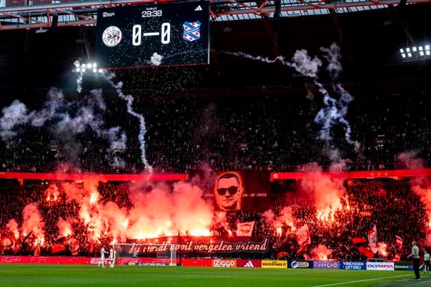 Ajax supporters pay tribute to a deceased fellow supporter with fireworks and flares during the match AFC Ajax Amsterdam vs SC Heerenveen at the Johan Cruijff Arena for the Dutch Vriendenloterij Eredivisie season 2025-2026 in AMSTERDAM, Netherlands on 1 November 2025, (photo by Stefan Koops EYE4images DeFodi Images) Ajax supporters pay tribute to a deceased fellow supporter with fireworks and flares during the match AFC Ajax Amsterdam vs SC Heerenveen at the Johan Cruijff Arena for the Dutch Vriendenloterij Eredivisie season 2025 2026 in AMSTERDAM, Netherlands on 1 November 2025, photo by Stefan Koops EYE4images DeFodi Images