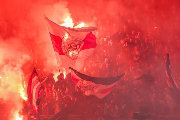 2025-11-01 Ajax v sc Heerenveen - Dutch Eredivisie AMSTERDAM, NETHERLANDS - NOVEMBER 1: Fans and Supporters of AFC Ajax set off flares to remember the death of an Ajax fan Patrick Overeem during the Dutch Eredivisie match between Ajax and sc Heerenveen at Johan Cruijff ArenA on November 1, 2025 in Amsterdam, Netherlands. Amsterdam Johan Cruijff ArenA Netherlands Content not available for redistribution in The Netherlands directly or indirectly through any third parties. Copyright: xBenxGalx