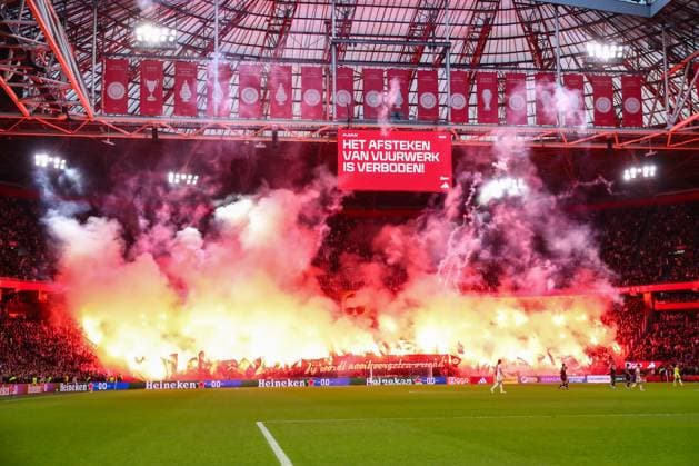 2025-11-01 Ajax v sc Heerenveen - Dutch Eredivisie AMSTERDAM, NETHERLANDS - NOVEMBER 1: Fans and Supporters of AFC Ajax set off flares to remember the death of an Ajax fan Patrick Overeem during the Dutch Eredivisie match between Ajax and sc Heerenveen at Johan Cruijff ArenA on November 1, 2025 in Amsterdam, Netherlands. Amsterdam Johan Cruijff ArenA Netherlands Content not available for redistribution in The Netherlands directly or indirectly through any third parties. Copyright: xBenxGalx